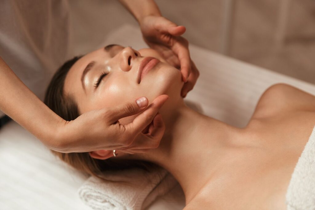 woman enjoying a relaxing facial treatment at a med spa